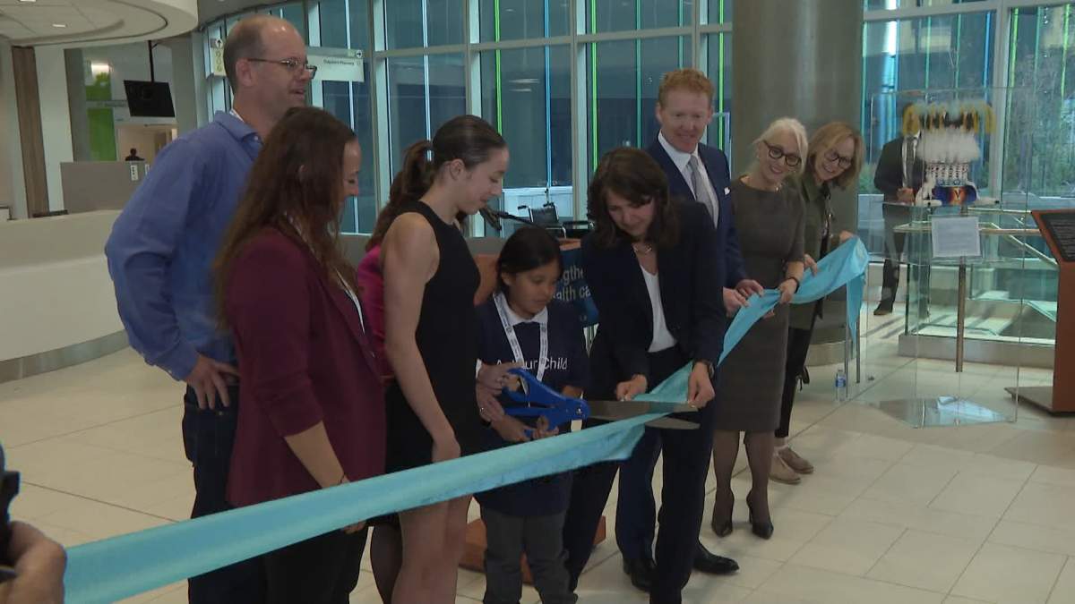 Premier Danielle Smith joins cancer patients, the families and a host of other dignitaries for the official ribbon cutting of the new Calgary Cancer Centre.