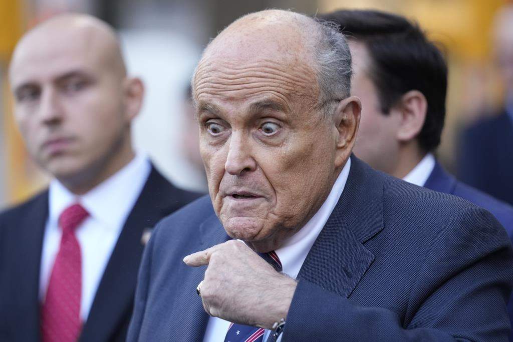Former New York Mayor Rudy Giuliani speaks to the media as he leaves court in New York, Thursday, Nov. 7, 2024.