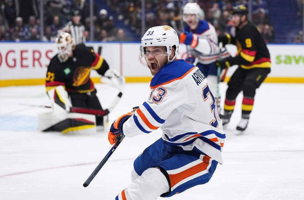 Edmonton Oilers' Viktor Arvidsson (33) celebrates his goal against the Vancouver Canucks during the second period of an NHL hockey game in Vancouver, on Saturday, Nov. 9, 2024.
