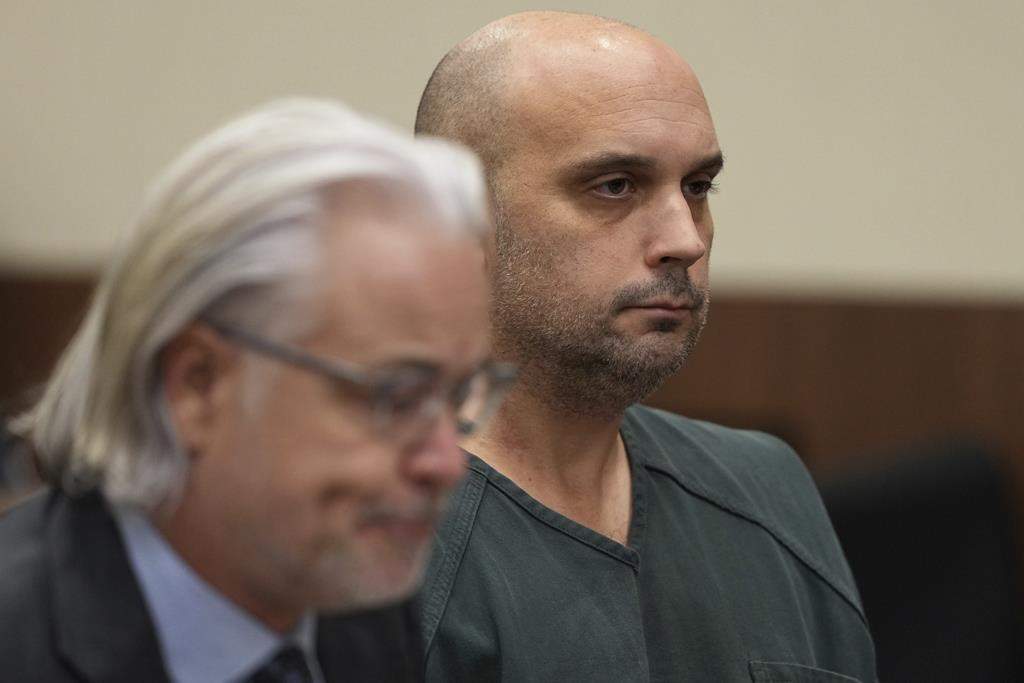 Sean M. Higgins, right, the driver charged with killing NHL hockey player Johnny Gaudreau and his brother Matthew as they bicycled on a rural road, appears at the Salem County, N.J., Courthouse with his lawyer Matthew Portella, Tuesday, Nov. 12, 2024, in Salem, N.J.