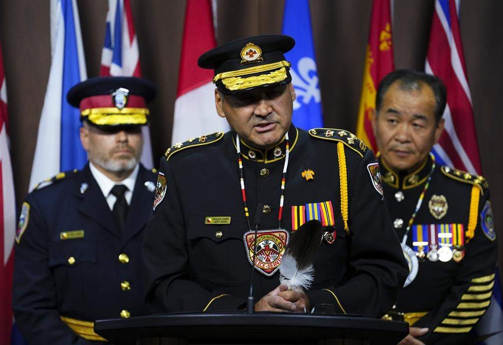 Chief Of Anishinabek Police Services Jeff Skye is joined by UCCM Anishnaabe Chief of Police James Killeen, left, and Treaty Three Police Chief Kai Liu as he speaks at a press conference on Parliament Hill in Ottawa, Monday, June 12, 2023. 