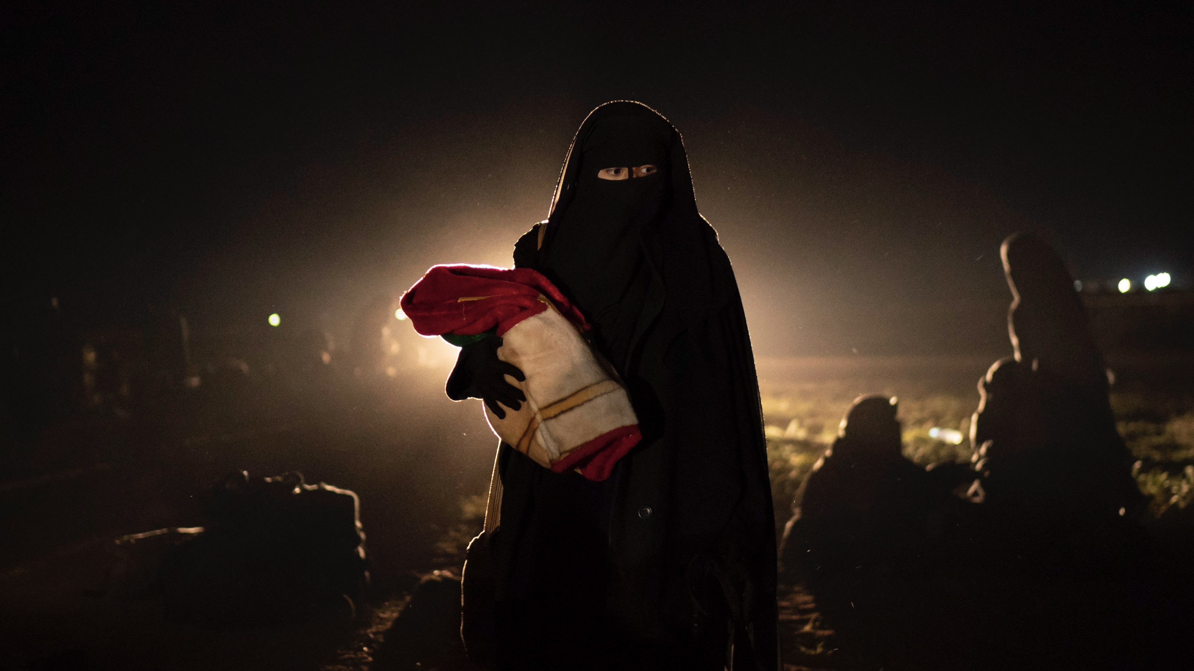 A woman evacuated out of ISIS territory during the terror group’s collapse, Baghouz, Syria, Feb. 25, 2019. (AP Photo/Felipe Dana)