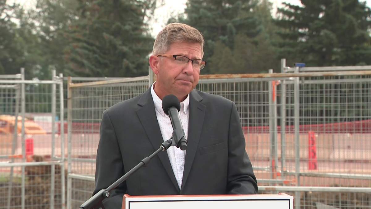 Tim Cartmell at a news conference in Edmonton.