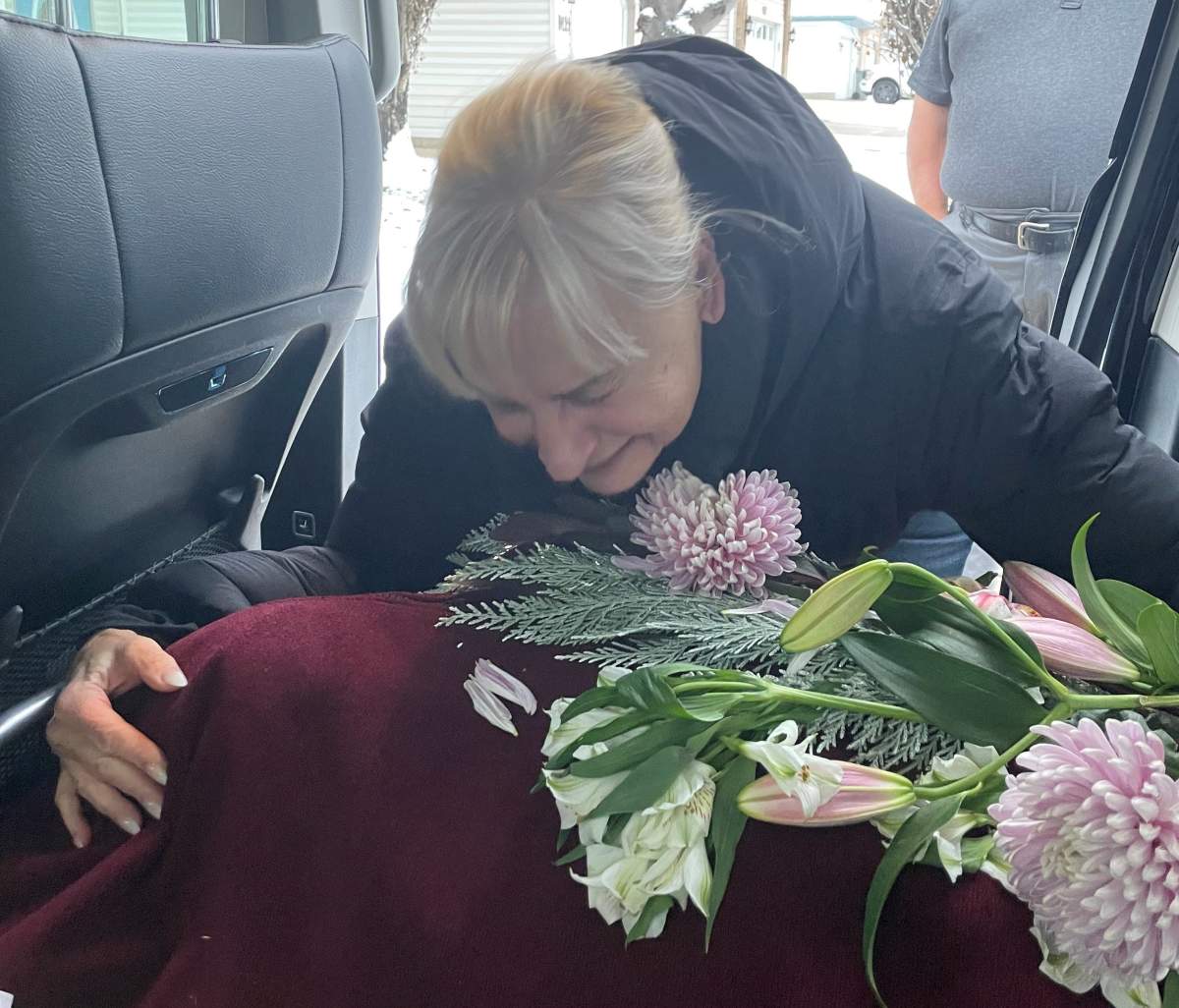 Joanna Van-Heuval's body being taken home to Grande Prairie to be buried.