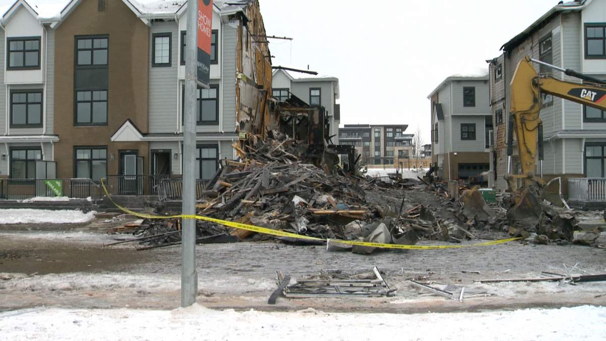 ATCO confirms to Global News that it was investigating a gas line that had been struck by a contractor at the time of an explosion and fire in a Calgary townhouse complex on Thursday (Nov. 21, 2024)
