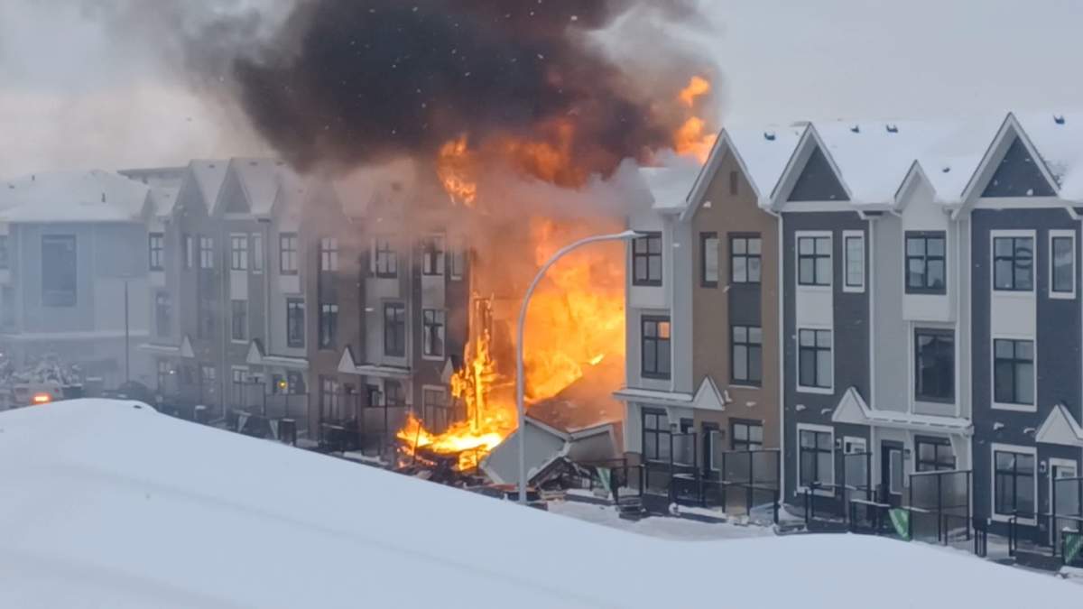 The Calgary Fire Department says when crews arrived on scene they discovered a townhouse on fire and debris scattered around the area from what appeared to be an explosion.