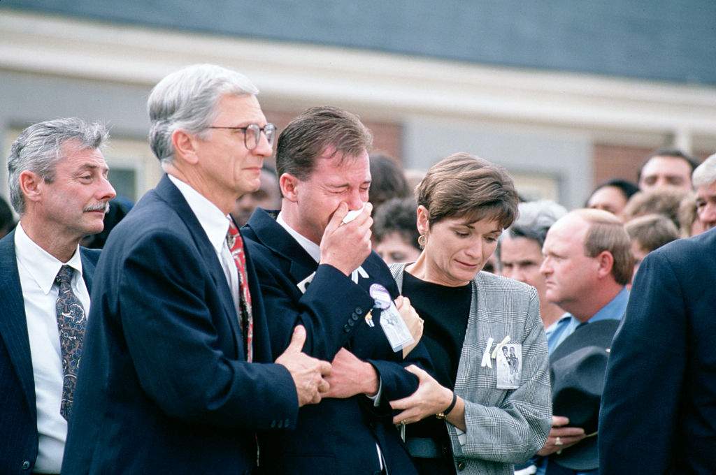Susan Smith was convicted on July 22, 1995 of murdering her two sons, 3-year-old Michael Daniel Smith, born October 10, 1991, and 14-month-old Alexander Tyler Smith. David Smith, father of the boys, leaves the church after funeral services.