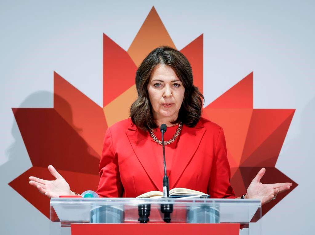 Alberta Premier Danielle Smith speaks to the media in Calgary, Monday, Sept. 18, 2023.