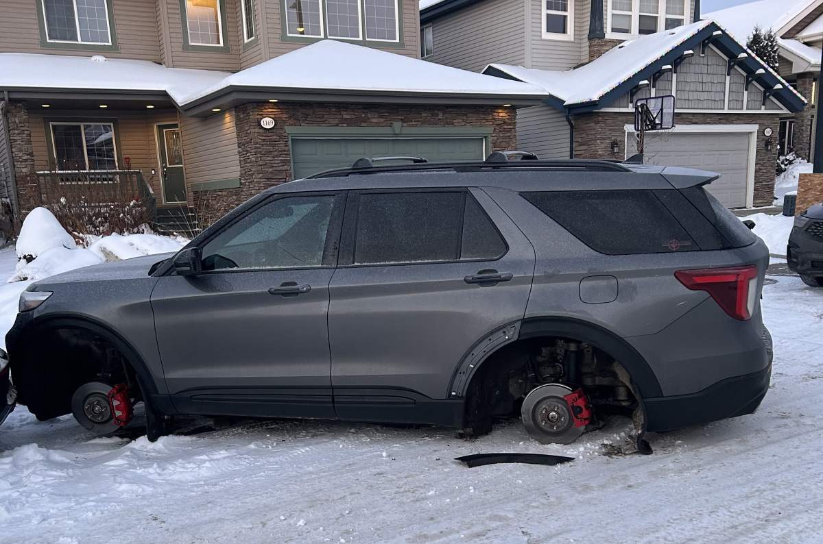Shannon Mellott’s vehicle sits where she parked it, missing all four tires.