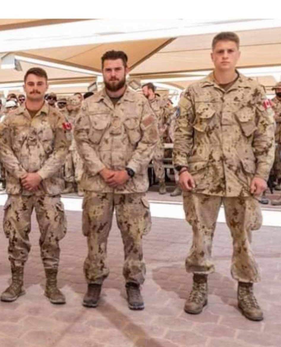 Nathaniel Burchat, right, on deployment with the Canadian Armed Forces in the Middle East.