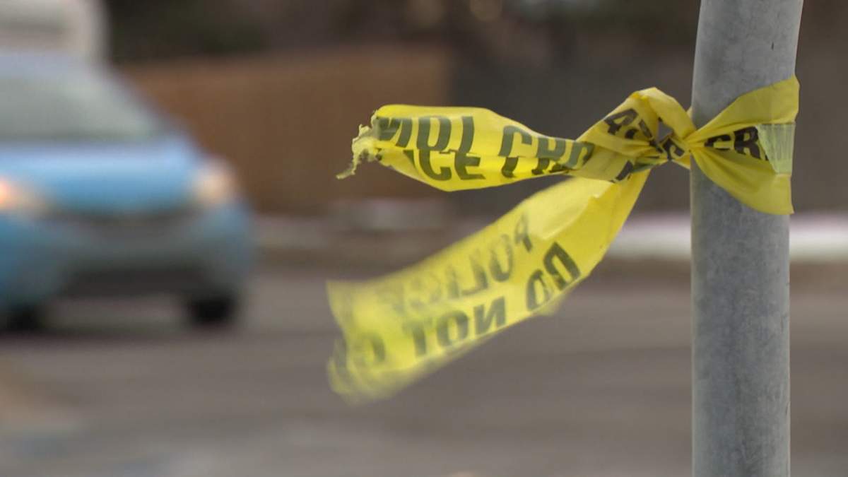 A small piece of police tape still remains at the intersection of Elbow Drive and 61st Avenue S.W. following a fatal crash involving pedestrian