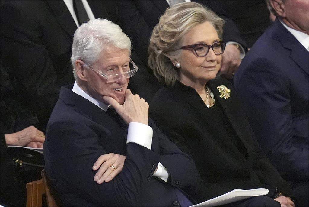 Former President Bill Clinton and former Secretary of State Hillary Clinton listen during the state funeral for former President Jimmy Carter at Washington National Cathedral in Washington, Thursday, Jan. 9, 2025.
