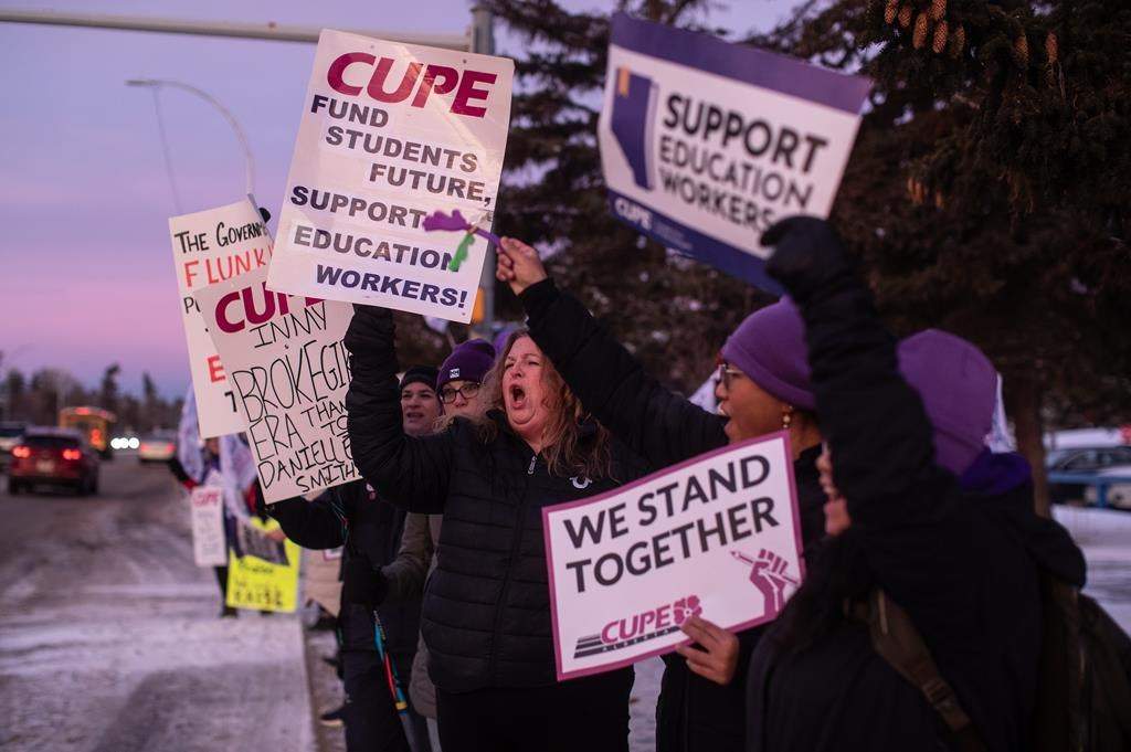 Union members and supporters picket for better education funding, and more classroom support in Edmonton, on Monday Jan. 13, 2025.