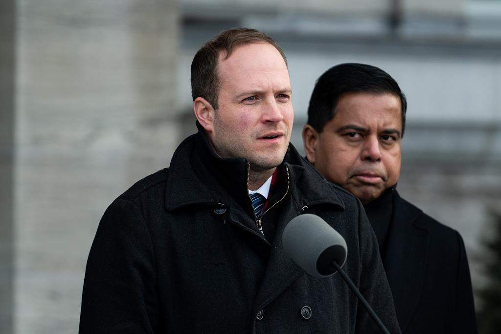 Minister of Housing, Infrastructure and Communities Nate Erskine-Smith speaks to reporters following a cabinet shuffle at Rideau Hall in Ottawa on Dec. 20, 2024. The federal government had inked deals with nine Ontario municipalities and two Saskatchewan cities to address homelessness.THE CANADIAN PRESS/Spencer Colby.