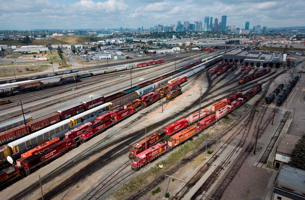 Railcars and locomotives are shown at the CPKC railyard in Calgary on Aug. 22, 2024.