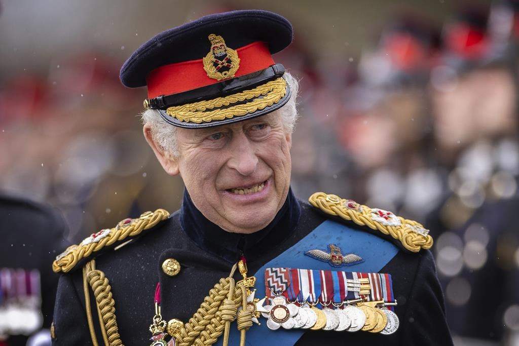 Britain's King Charles III inspects the 200th Sovereign's parade at Royal Military Academy Sandhurst, in Camberley, England, Friday, April 14, 2023. 