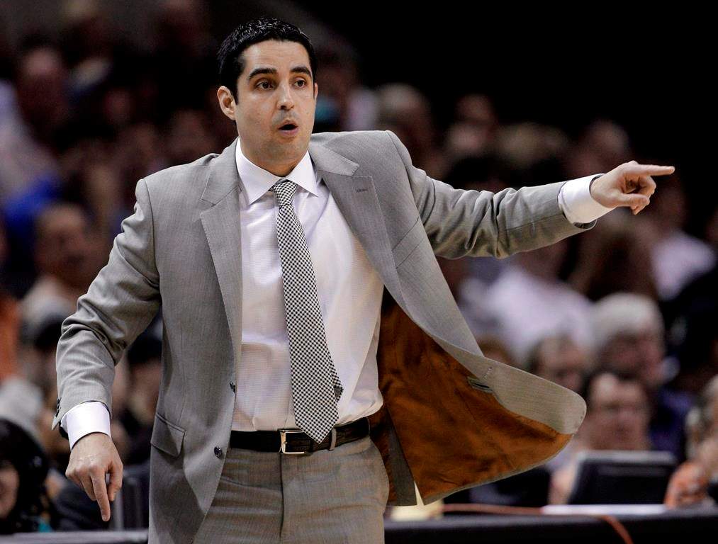 Portland Trail Blazers coach Kaleb Canales talks to his players during the first quarter of an NBA basketball game against the San Antonio Spurs, Monday, April 23, 2012, in San Antonio.