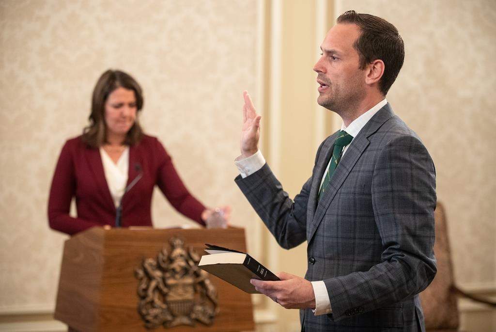 Alberta Jobs Minister Matt Jones, pictured here at his swearing in 2023, says the temporary leave measure will insure reservists keep their civilian jobs while deployed on G7 duties. THE CANADIAN PRESS/Jason Franson.