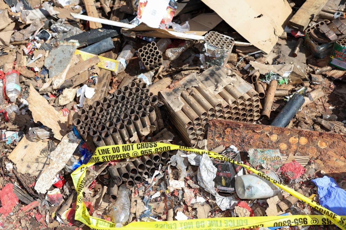 Fireworks debris is seen outside the home where a New Year’s Eve fireworks explosion killed and injured people, Wednesday, Jan. 1, 2025, in Honolulu. (AP Photo/Marco Garcia)