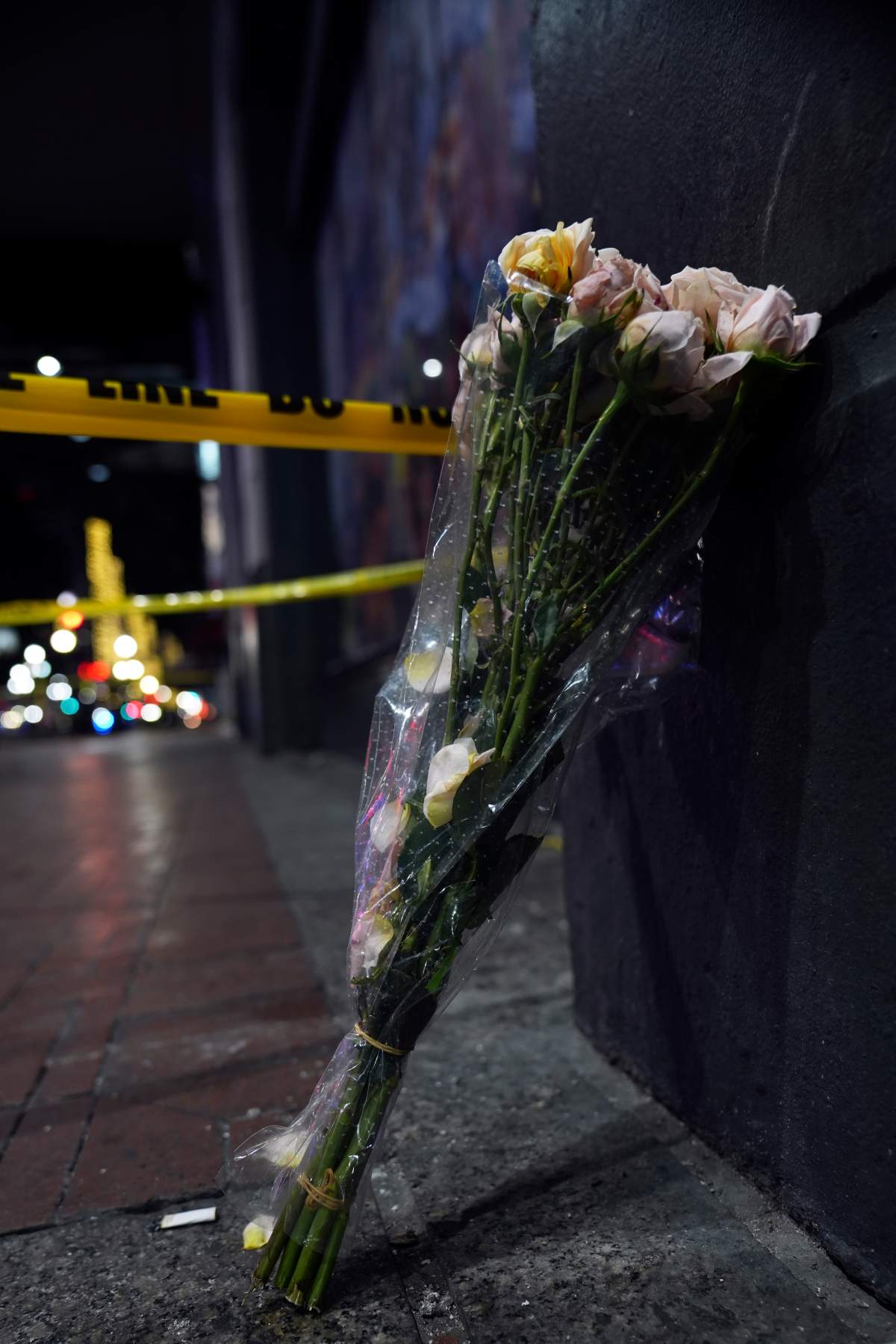 Flowers are seen near where a vehicle drove into a crowd on New Orleans’ Canal and Bourbon streets, Wednesday, Jan. 1, 2025. (AP Photo/George Walker IV)