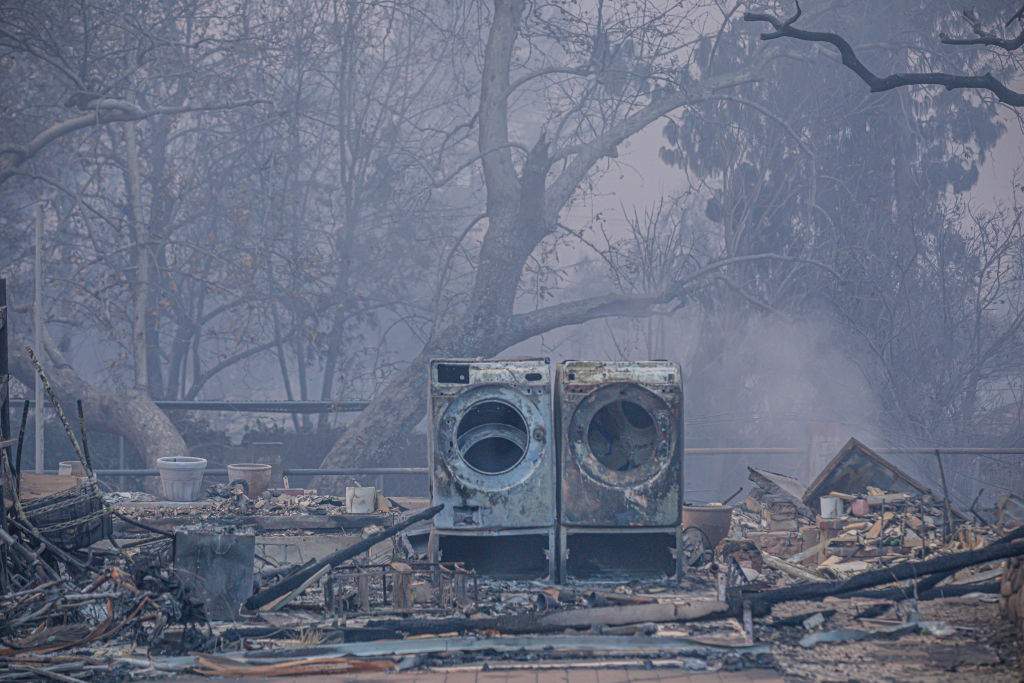 The remnants of a washer and dryer during the Eaton Fire in Altadena, Calif., on Wed., Jan. 8, 2025.