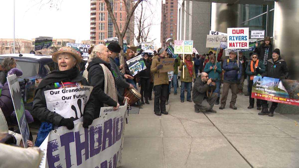 A large crowd gathers outside an AER hearing into a controversial proposal to mine for coal in the Rocky Mountains.