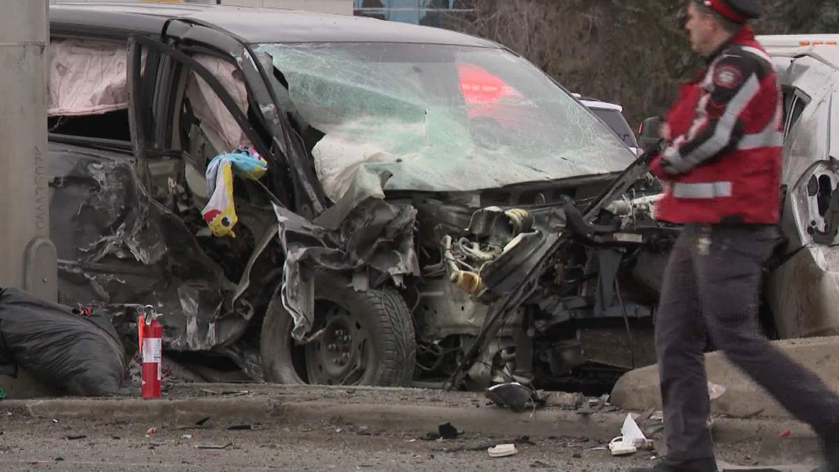 The fatal Boxing Day crash involved a total of five vehicles and Macleod Trail was shut down for several hours will police investigated.