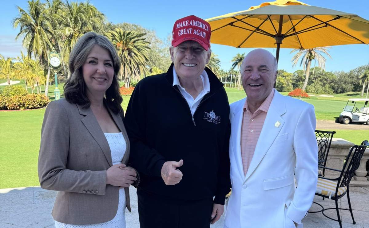 Alberta Premier Danielle Smith poses with Donald Trump and businessman Kevin O'Leary during her visit with him in Florida, prior to his inauguration as the new U.S. President in January 2025.
