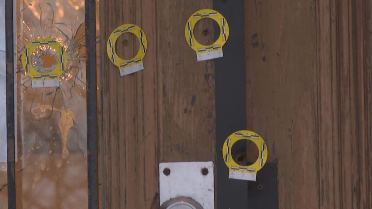 At least six bullets hole can be seen lodged in the main entrance of the Dompamine Addiction day center, shattering windows and piercing through to the interior.