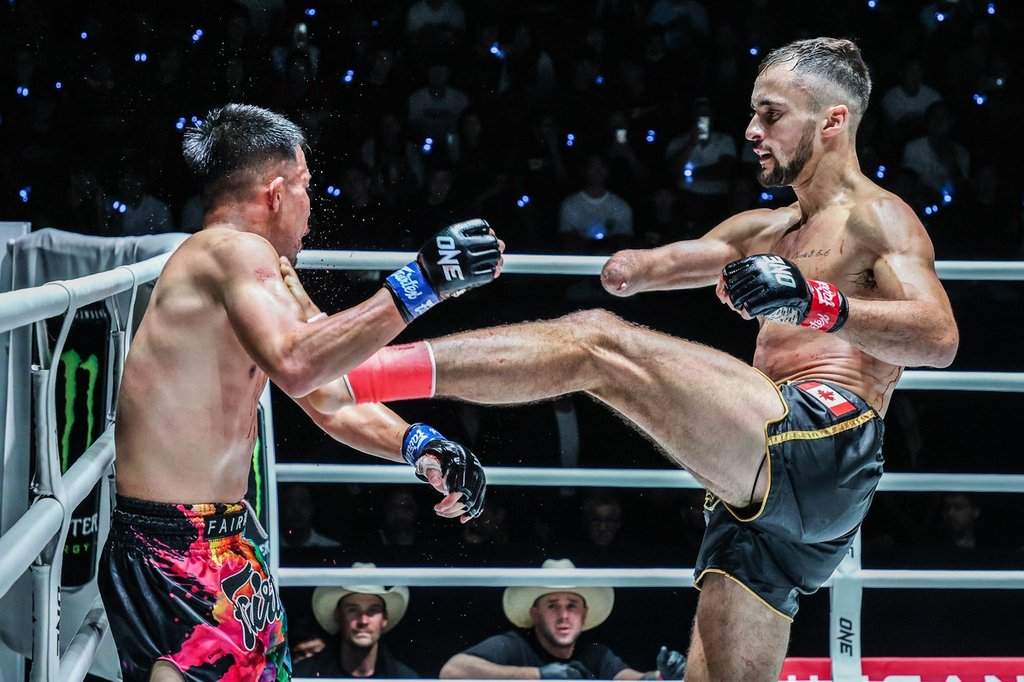 Calgary Muay Thai fighter Jake Peacock is shown during his win over Japan's Shinji Suzuki in his One Championship debut on April, 5, 2024, at Lumpinee Stadium in Bangkok. Peacock was born without a right hand.
