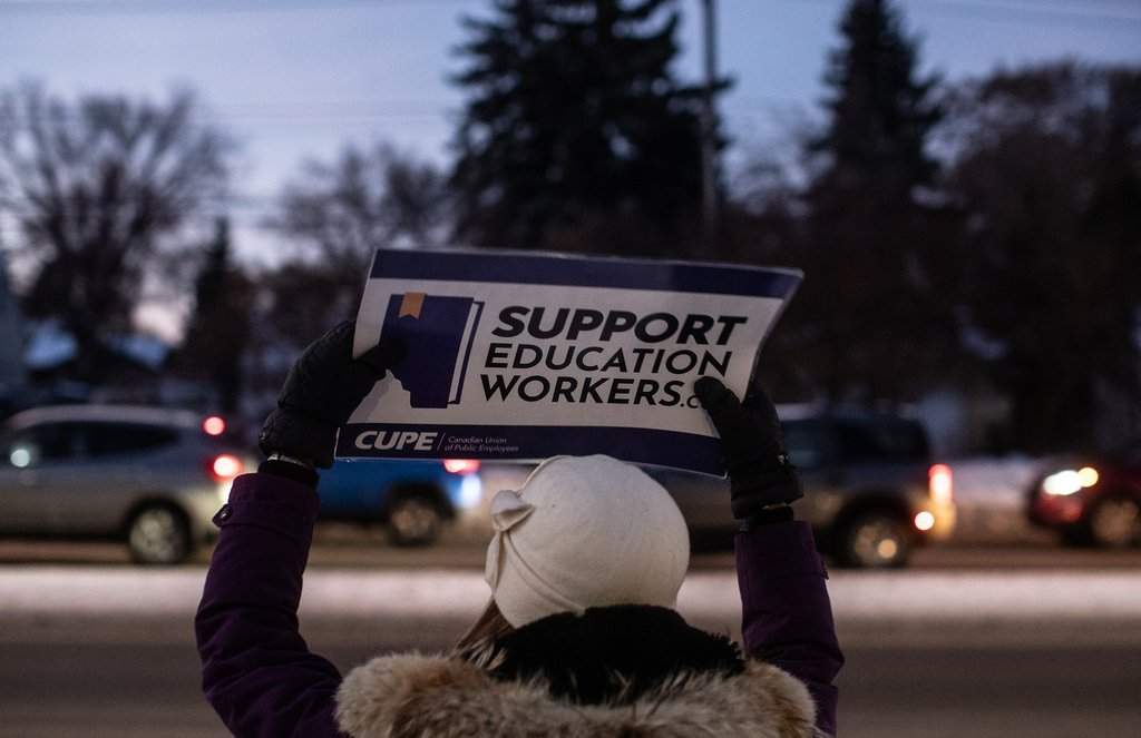 The public school board employing thousands of striking school support workers says the union representing them has left the bargaining table. Union members and supporters picket for better education funding, and more classroom support in Edmonton, on Monday, Jan. 13, 2025.