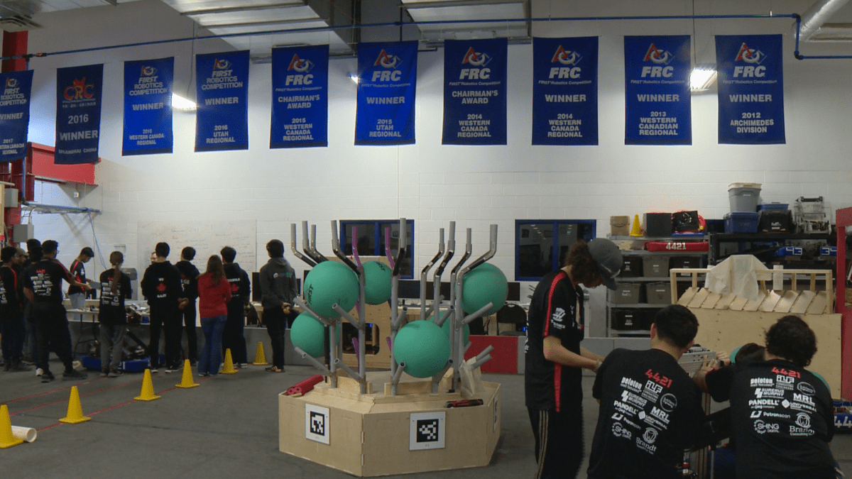 Students work on robots at the Alberta Tech Alliance Association.