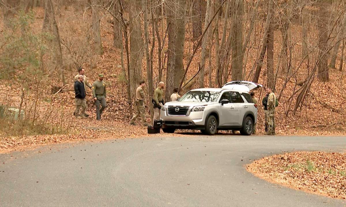 FBI agents search a neighborhood in Chapel Hill, North Carolina on Wednesday, Feb. 5, 2025, where Teresa Youngblut and Felix Bauckholt, who were involved in the shooting death of a U.S. Border Patrol agent in Vermont, had been renting homes in the neighborhood, their landlord told The Associated Press.