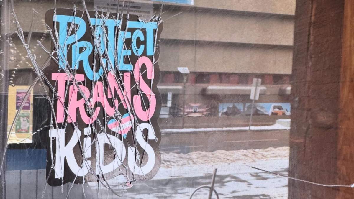 The window of Evolution Wonderlounge was defaced in downtown Edmonton in December 2024.