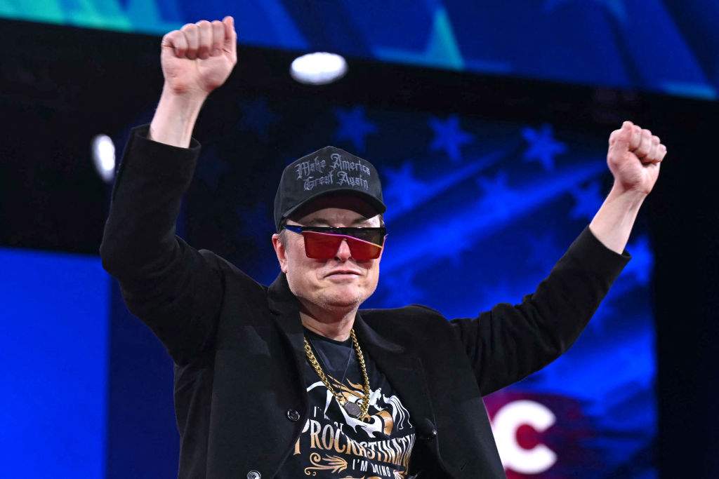 Elon Musk walks on stage during the annual Conservative Political Action Conference (CPAC) at the Gaylord National Resort & Convention Center at National Harbor in Oxon Hill, Maryland, on February 20, 2025.