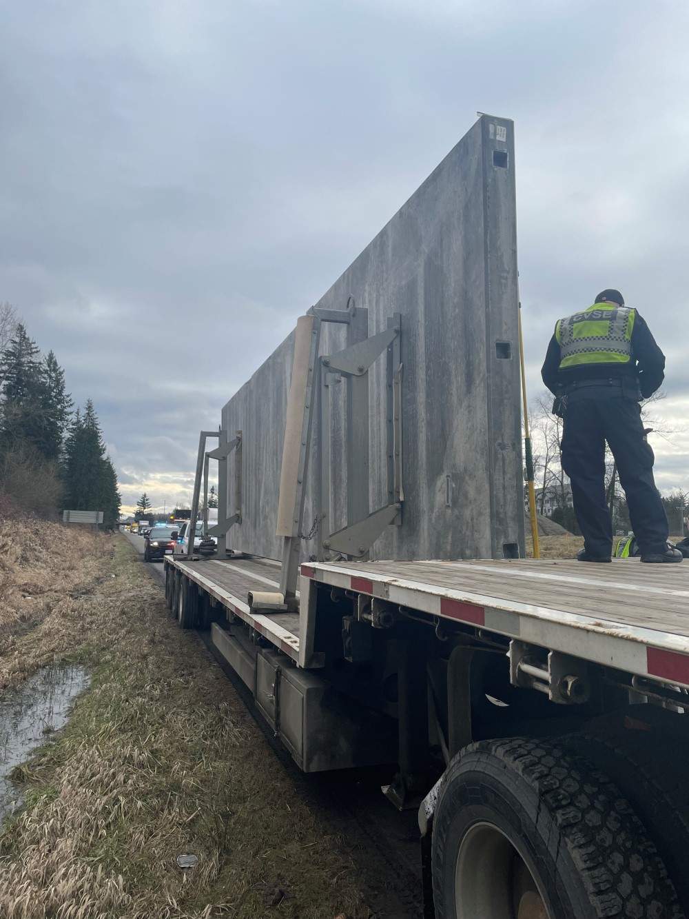 The truck was carrying a large load of pre-formed concrete.