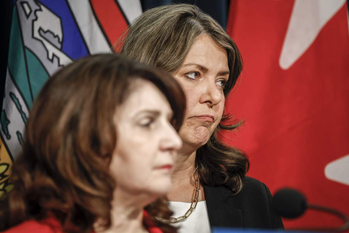 Alberta Premier Danielle Smith, right, and Minister of Health Adriana LaGrange provide an update on what steps the government is taking related to allegations by former Alberta Health Services CEO Athana Mentzelopoulos, in Calgary, Alta., Wednesday, Feb. 19, 2025.