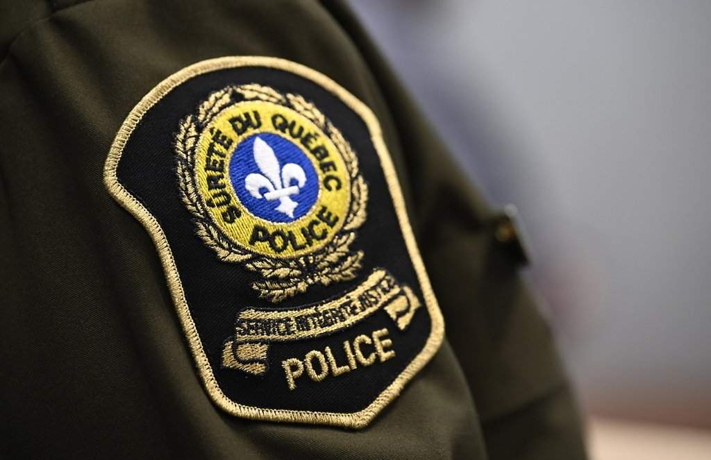 The Sûreté du Québec, or Quebec provincial police patch at a news conference in Quebec City, Thursday, Feb. 29, 2024. THE CANADIAN PRESS/Jacques Boissinot.