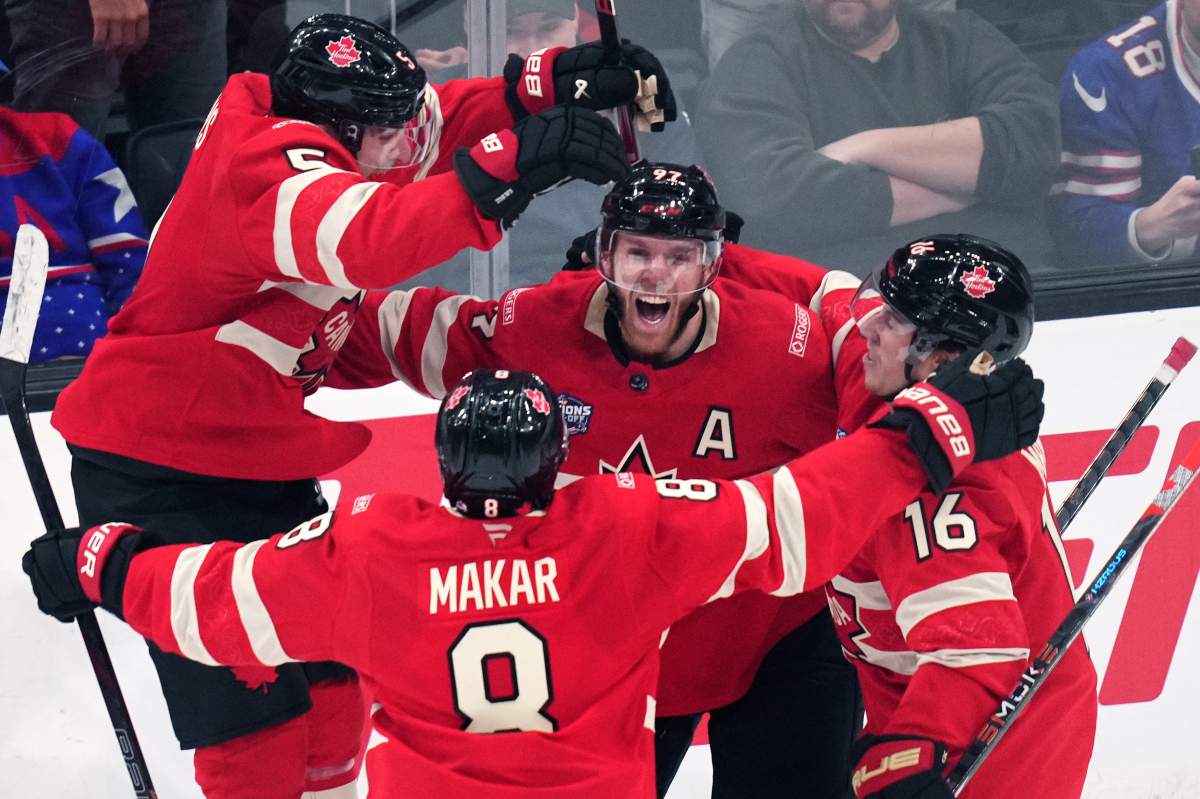 Canada's Connor McDavid (97) celebrates after his game-winning goal against the United States during an overtime period of the 4 Nations Face-Off championship hockey game, Thursday, Feb. 20, 2025, in Boston.