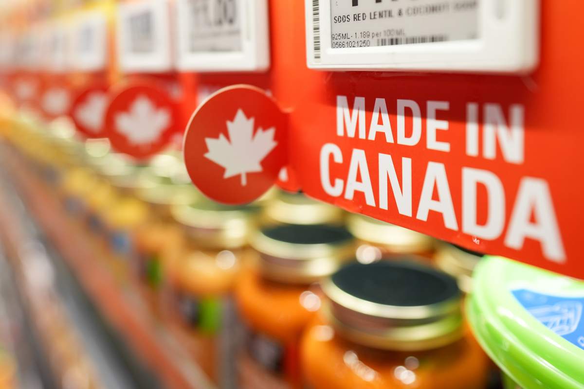 'Made in Canada' stickers around the price tags are seen at Loblaws grocery store in Toronto, Canada on February 3, 2025. 