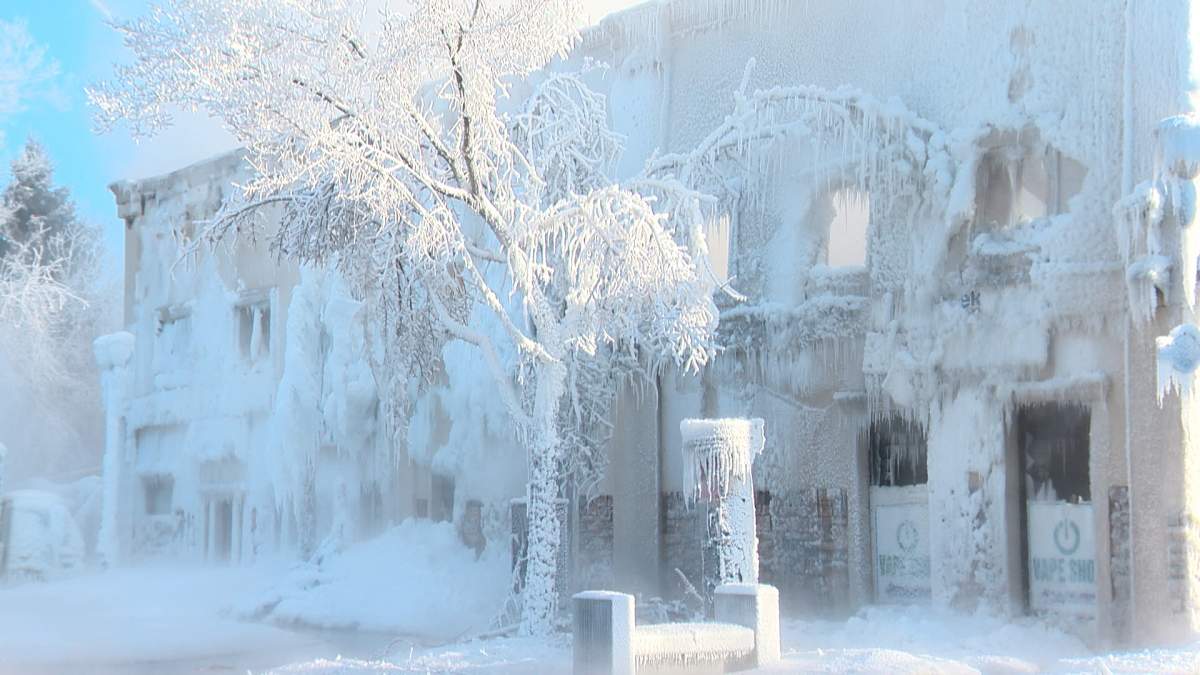 Extremely cold temperatures in Edmonton on Sunday turned the area around an early morning fire into a block of ice.
