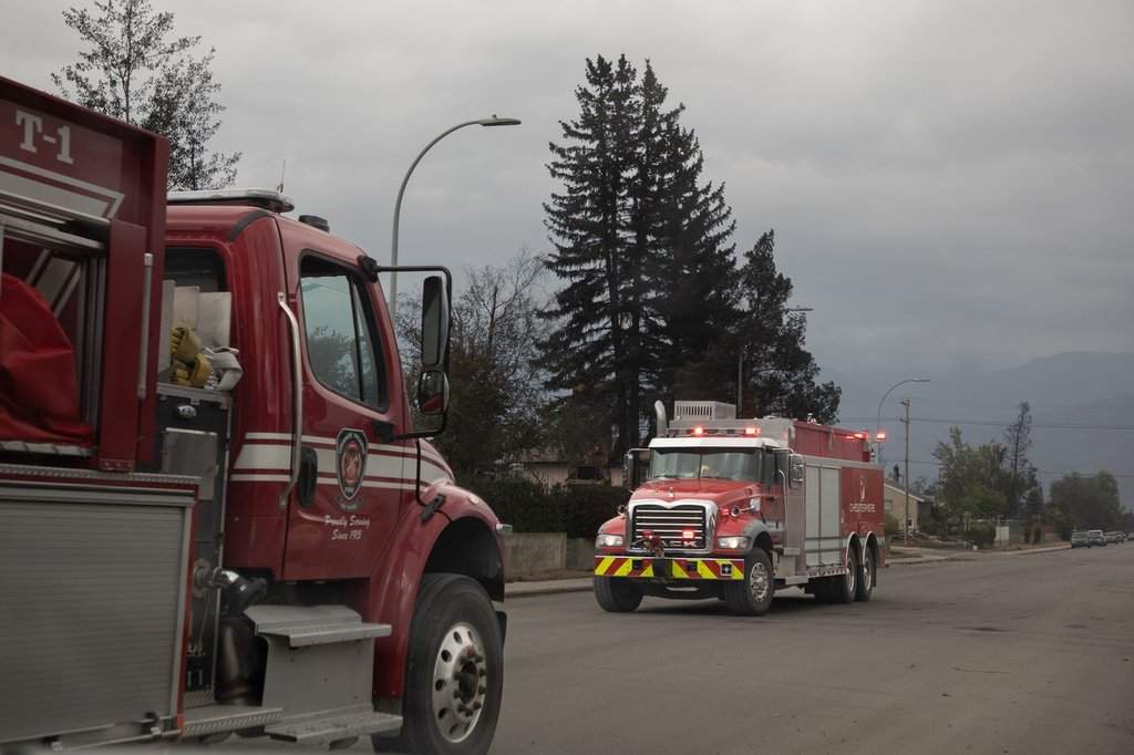 Fire trucks in Jasper, Alta., on Friday July 26, 2024. 