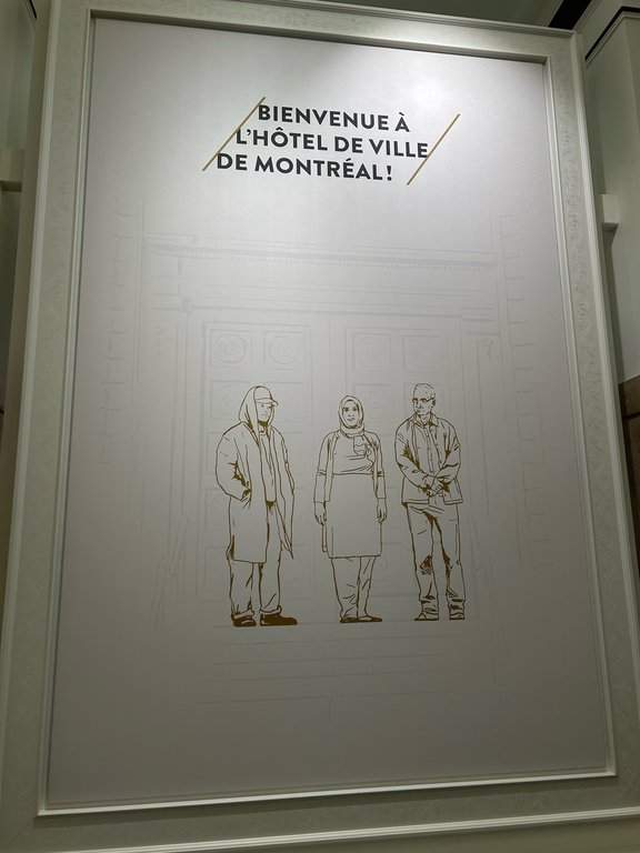The poster is shown at Montreal City Hall, Monday, Oct. 28, 2024.