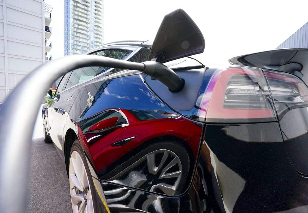 An electric vehicle is being charged.