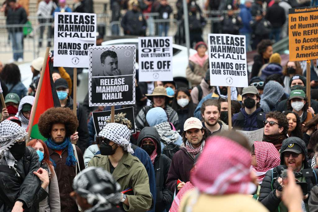 People gather outside of a New York court to protest the arrest and detention of Mahmoud Khalil at Foley Square on March 12, 2025 in New York City. A federal judge in New York heard arguments for and against the detention of Khalil, a permanent U.S. resident, green card holder and recent Columbia graduate, who is married to an American citizen, who played a role in pro-Palestinian protests at Columbia University. He was arrested by federal immigration agents in New York City and was subsequently transferred to a facility in Jena, Louisiana, where he is being held. The Trump administration is seeking to deport him over his participation in pro-Palestinian protests at the school. (Photo by Michael M. Santiago/Getty Images)
