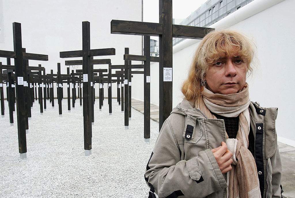Alexandra Hildebrandt attends the unveiling of the memorial to victims of the Berlin Wall she commissioned, on October 31, 2004 in central Berlin, Germany. Each of the 1056 crosses is to commemorate a person who died while trying to escape from the former communist East Germany. The memorial, commissioned by Alexandra Hildebrandt, who runs the nearby Museum at Checkpoint Charlie, is not without controversy as it is a privately funded project and the city of Berlin had no role in its creation. (Photo by Sean Gallup/Getty Images)