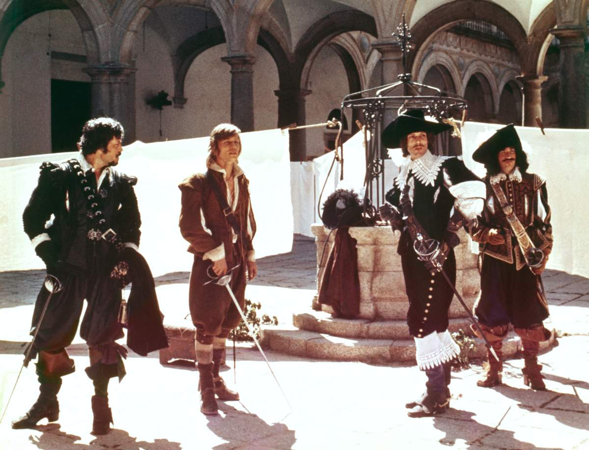 British actors Oliver Reed, Michael York, American Richard Chamberlain and British Frank Finlay on the set of 'The Three Musketeers' based on the novel by Alexandre Dumas père and directed by Richard Lester.