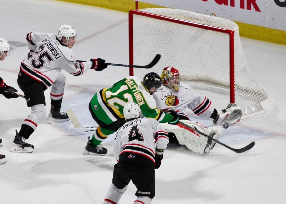 Kasper Halttunen of the London Knights scores a third period goal against Carter George in a 6-3 London win in Game 2 of the Western Conference quarter-finals on March 30, 2025 at Canada Life Place.