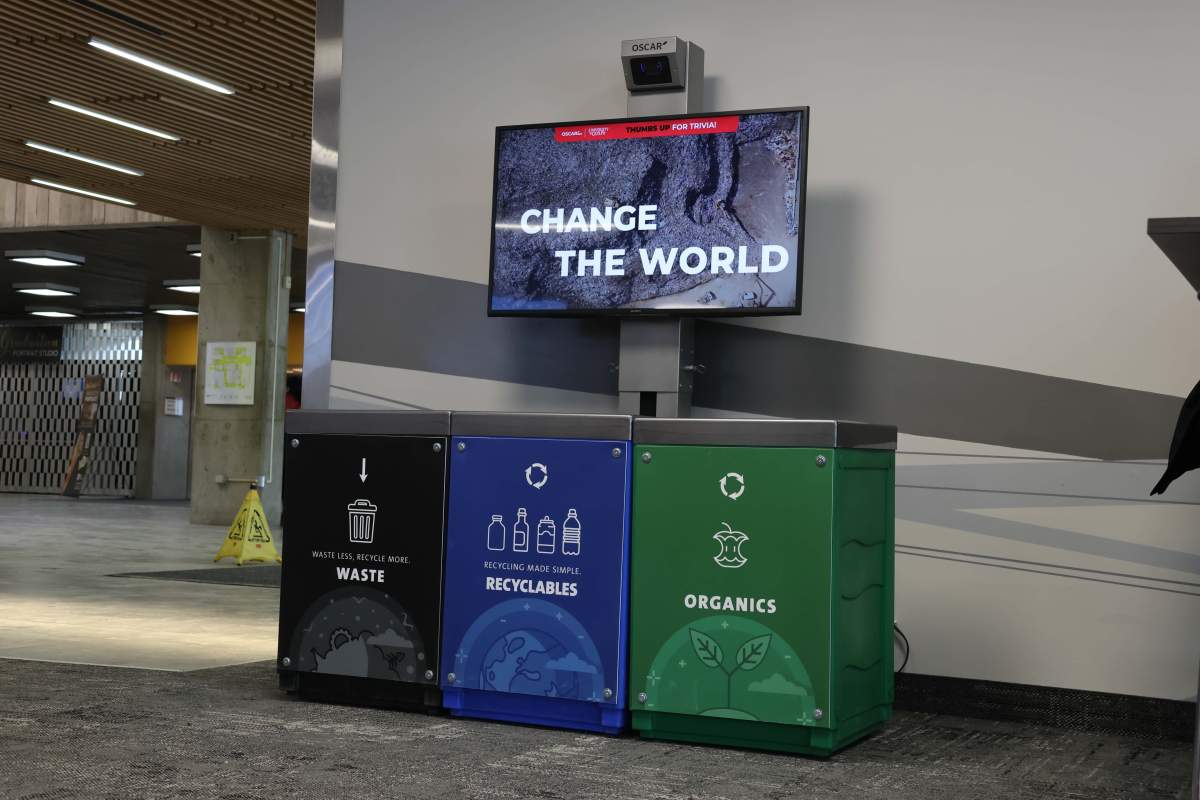 University of Guelph students sort trash using AI-powered recycling assistant - image