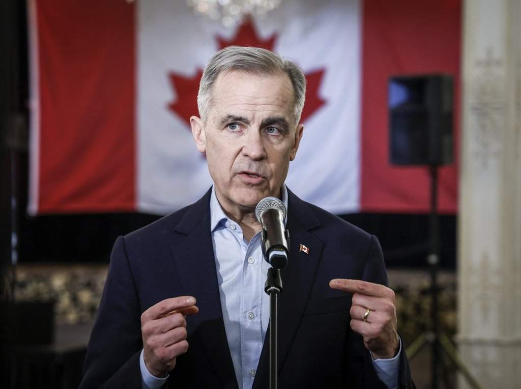Mark Carney speaks to the media in Calgary, Tuesday, March 4, 2025.